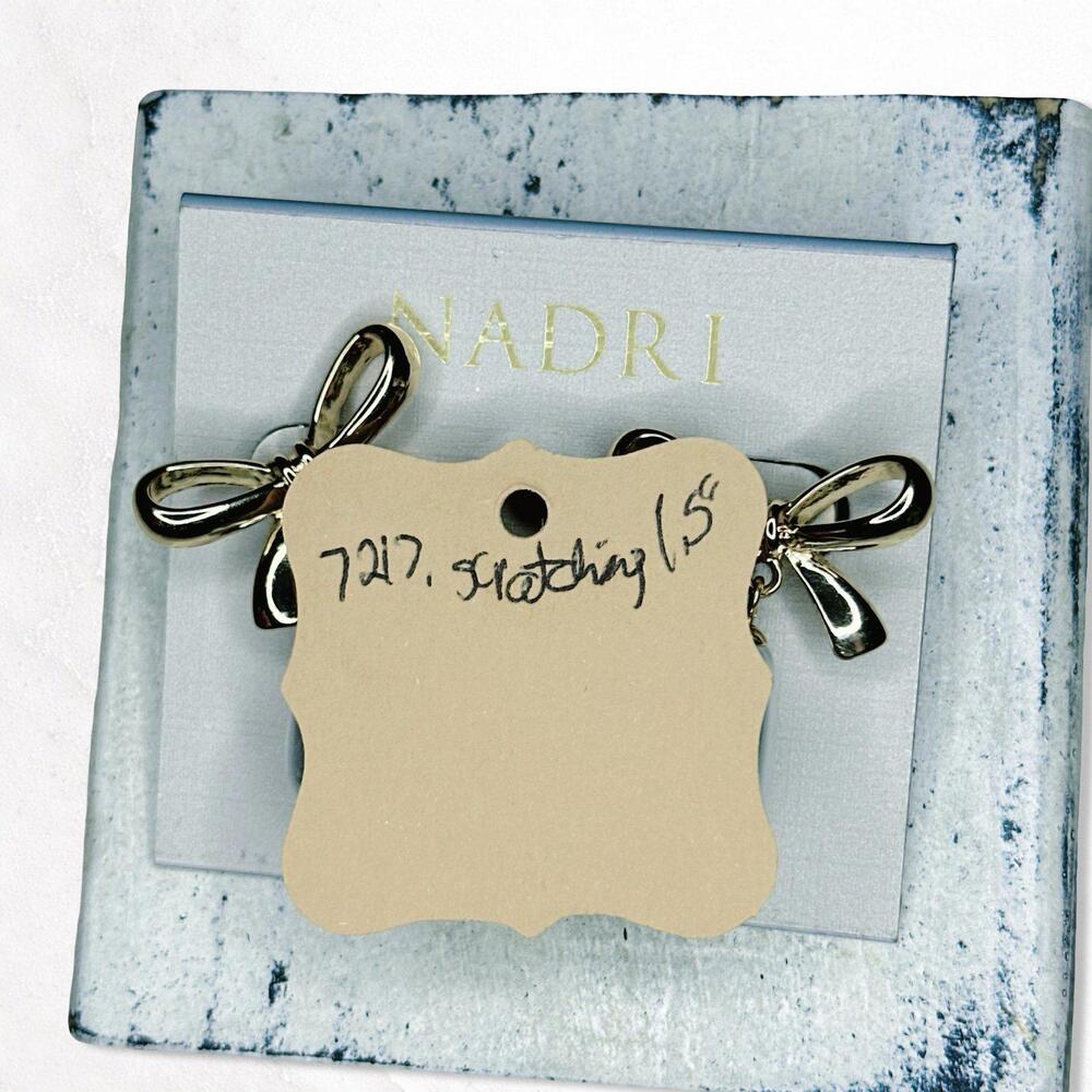 7217. Goldtone Bow Earrings Nadri - Picture 7 of 8